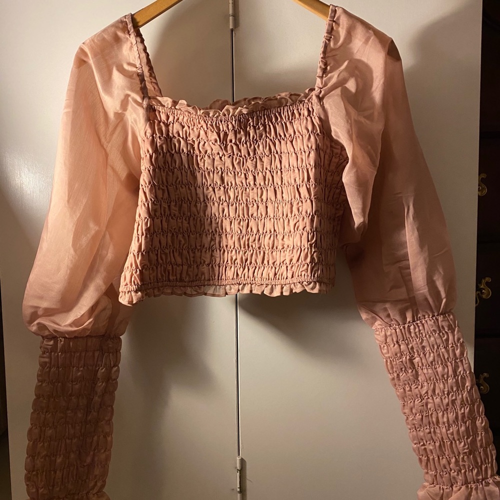 Short blush ruffled top